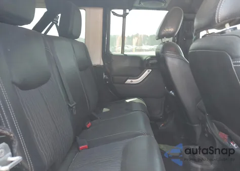 2014 Jeep Wrangler Unlimited Freedom Edition z USA, uszkodzony, nr VIN 1C4BJWDG0EL228649